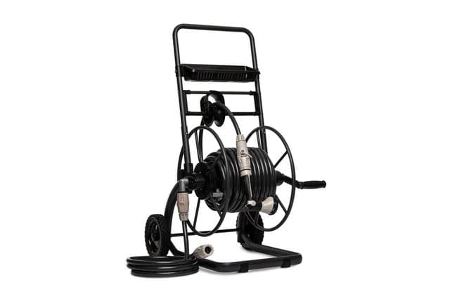 A black garden hose reel cart with wheels