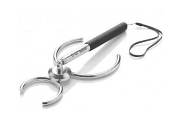 A black and silver device designed to help people pick up lawn bowls