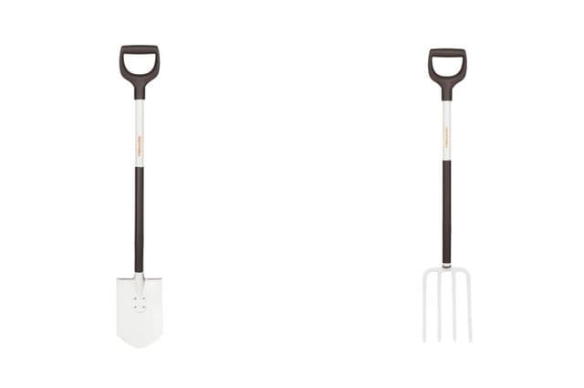 A long-handled gardening spade and fork