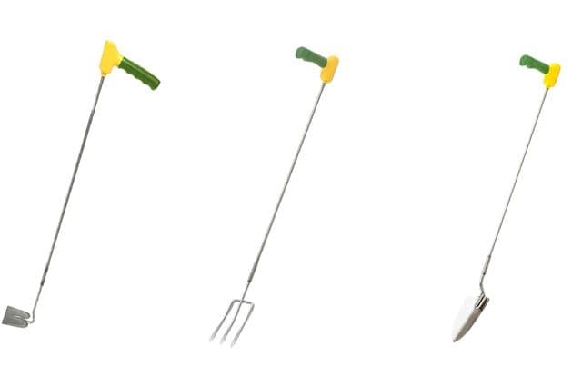 A long-handled fork, spade, and trowel with right-angled handles