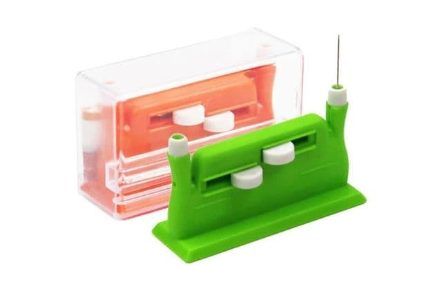 1 green and 1 orange automatic needle threaders
