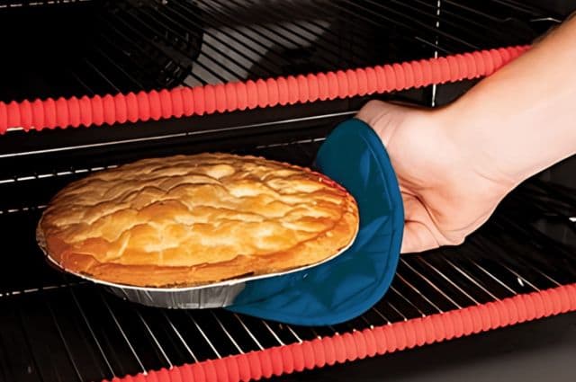 Two long red silicone guards attached to two oven racks