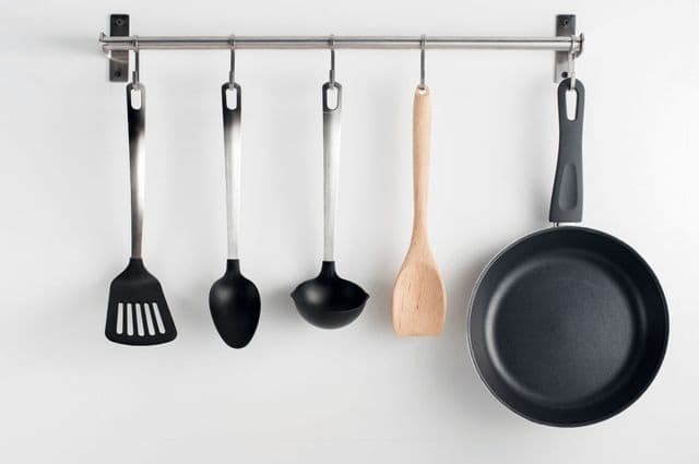 Cooking utensils hanging on a wall