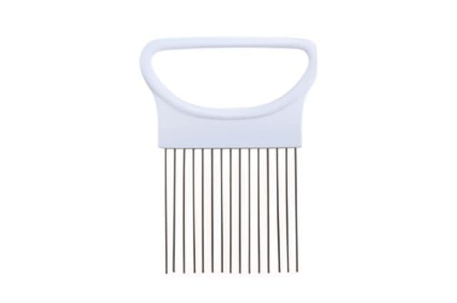 A slicing guide with a handle and several prongs to hold food items in place