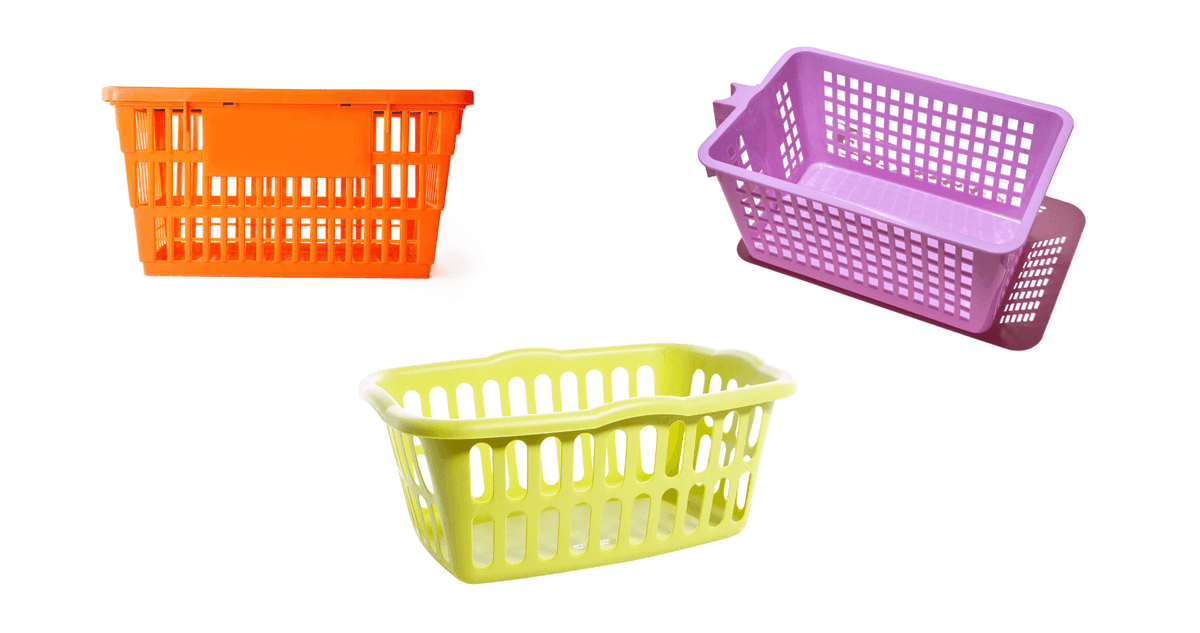 A pink basket, a purple basket, and a green basket