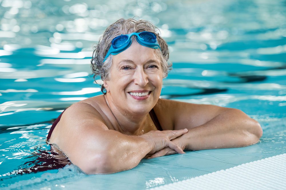 Healthy ageing Elderly lady in the swimming pool