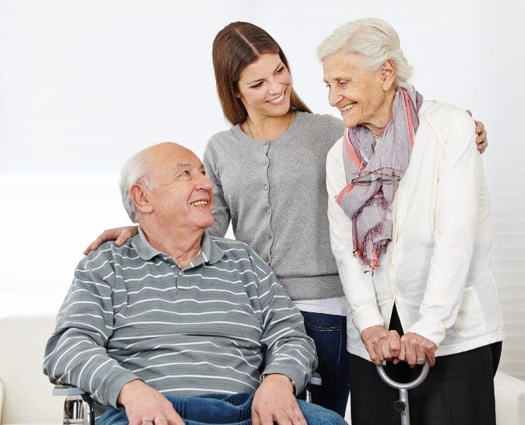 Support worker with elderly couple