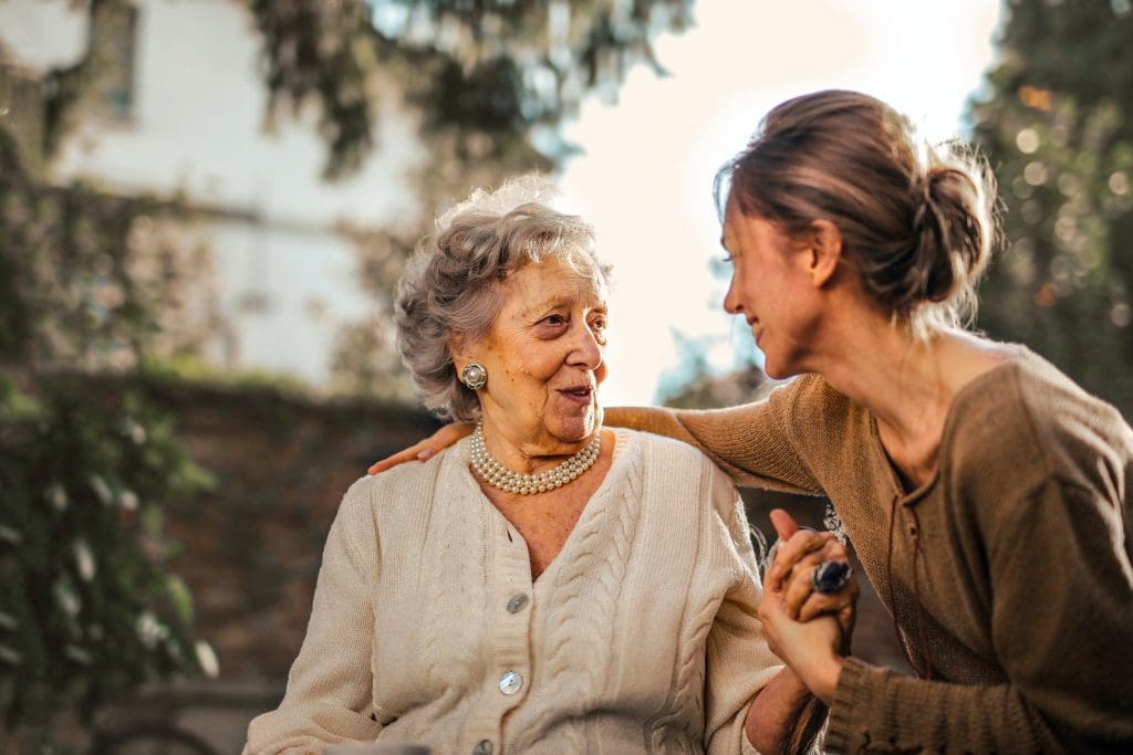 support worker with happy client