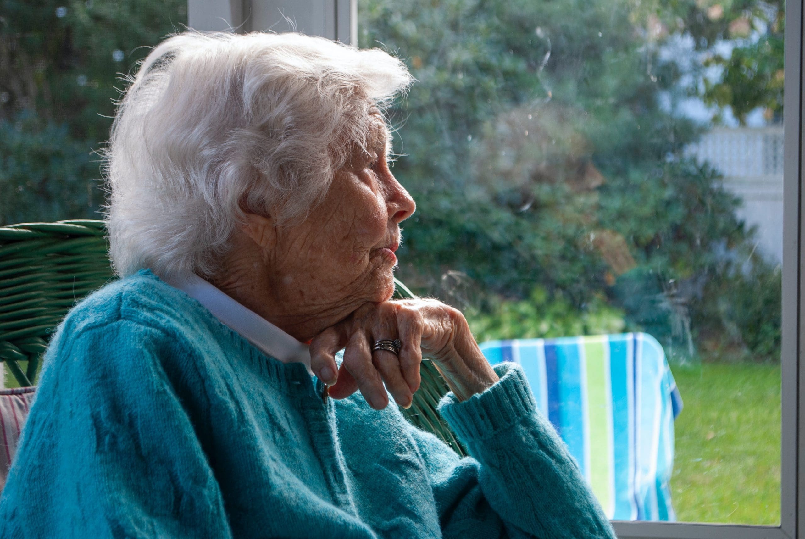 elderly lady in thoughtful pose